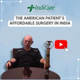 Thomas from the USA sharing his experience with surgical treatment in India on an IndiCure testimonial graphic.