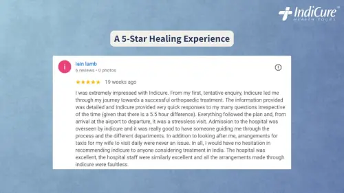 Five-star Google review from British patient Iain Lamb praising IndiCure Health Tours for a faultless hip replacement journey in India.