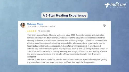 5-star Google review from an Australian patient about her Mommy Makeover journey in India with IndiCure.