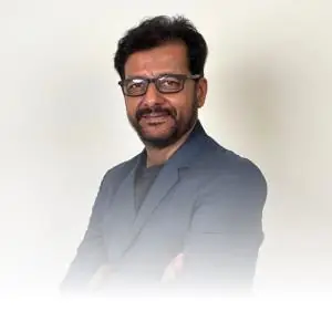 Image of the founder of IndiCure, Madhur Puri.